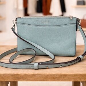 Kate Spade ice blue pebbled leather crossbody bag.